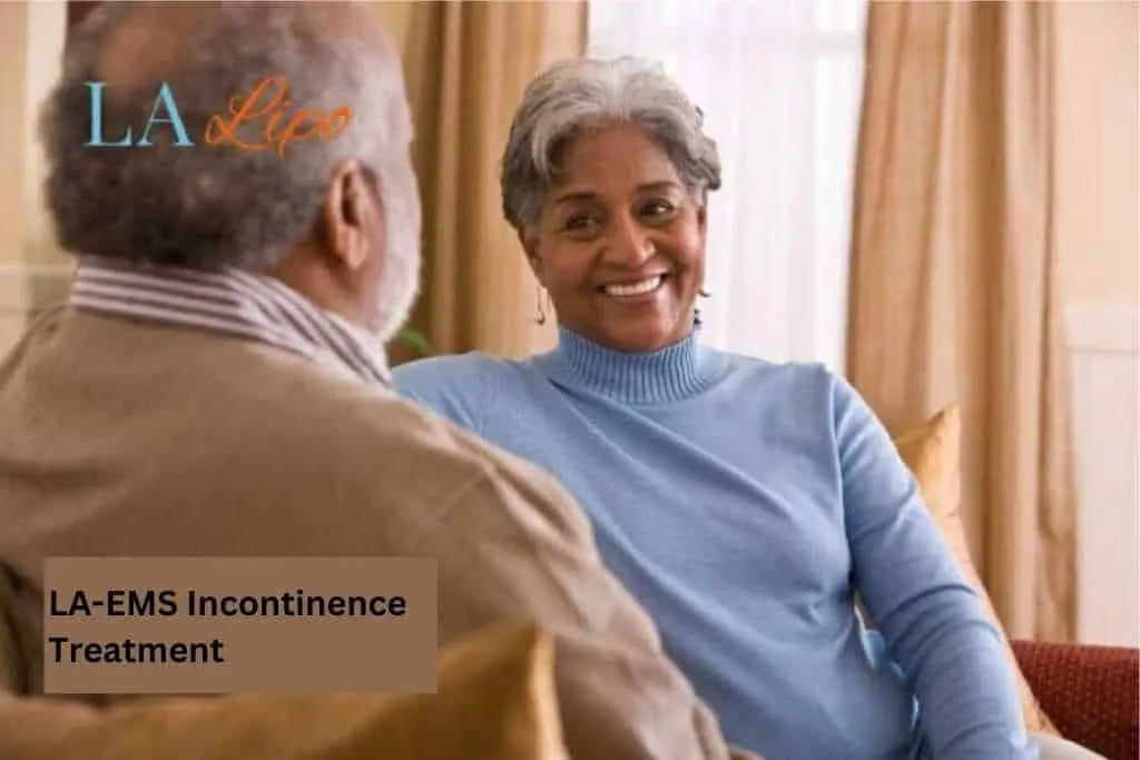 Couple sat smiling at each other - LA-EMS treatment Bishop's Stortford