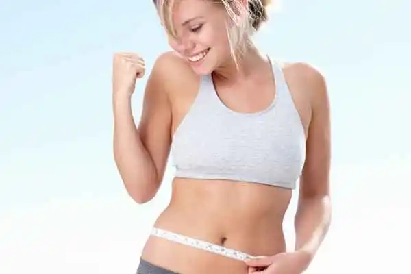 woman happy after fat reduction treatment Bishop's Stortford