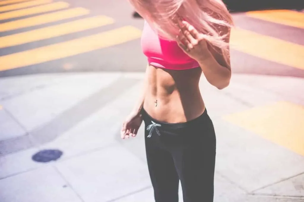 Woman with toned stomach after LA-EMS Body Sculpting Treatment Bishop's Stortford 